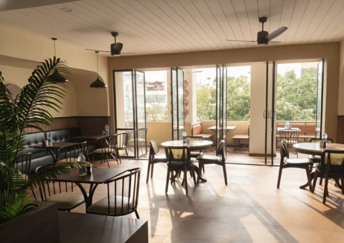 Sunlit seating at Cafe Here & Now